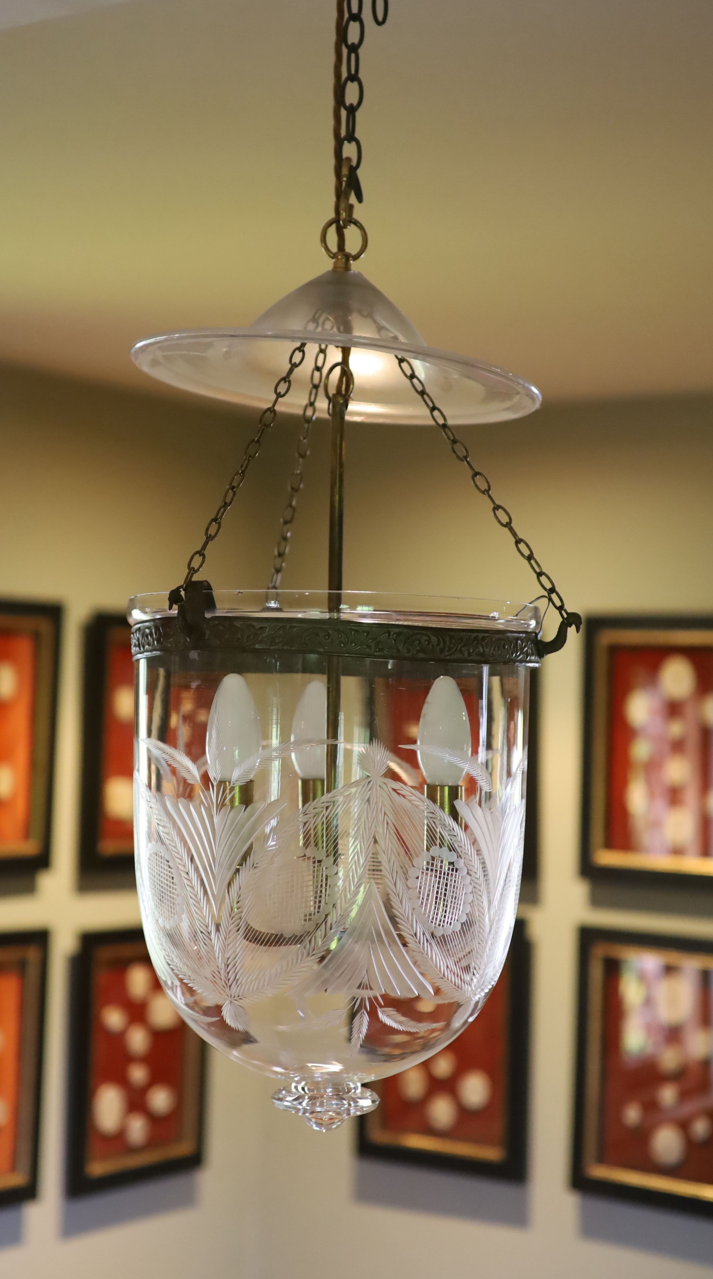 A cut and etched glass hurricane style ceiling light, height 54cm diameter 30cm, fitted for electricity
